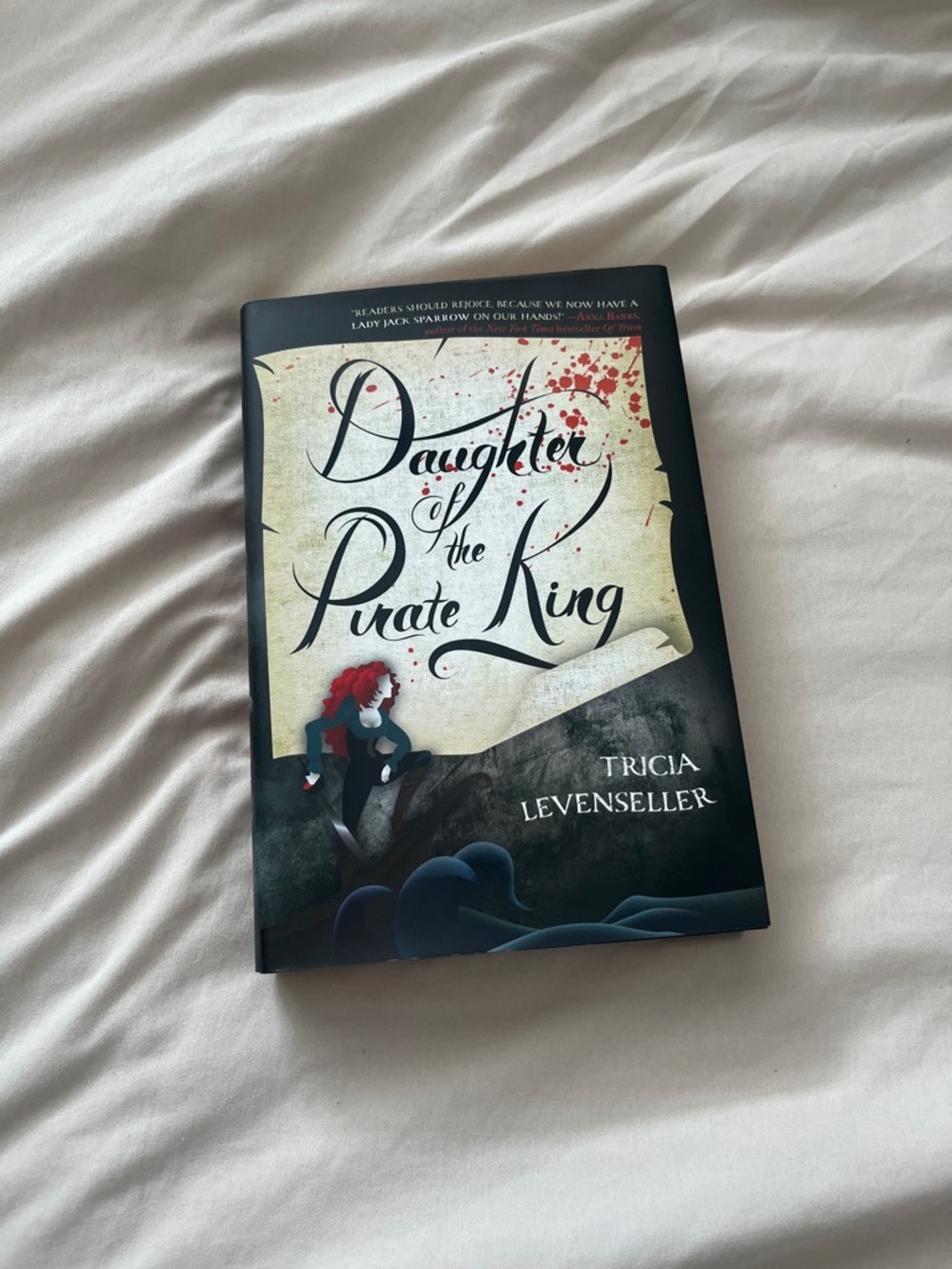 Daughter of the Pirate King by Tricia Levenseller - Black Cover with Red Accents